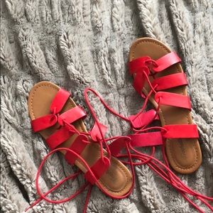 Red tie sandals